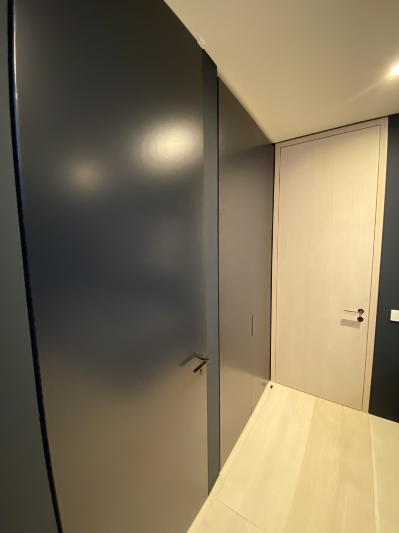 Professional MDF cabinet doors windows frames skirting boards spray painting for bespoke joinery and wardrobes in NW London by Kadeco Interiors.