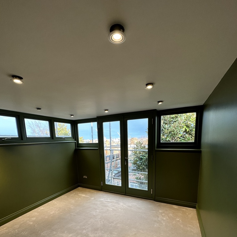 Professional MDF cabinet doors windows frames skirting boards spray painting for bespoke joinery and wardrobes in NW London by Kadeco Interiors.