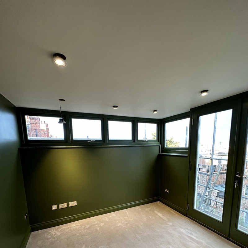 Professional MDF cabinet doors windows frames skirting boards spray painting for bespoke joinery and wardrobes in NW London by Kadeco Interiors.