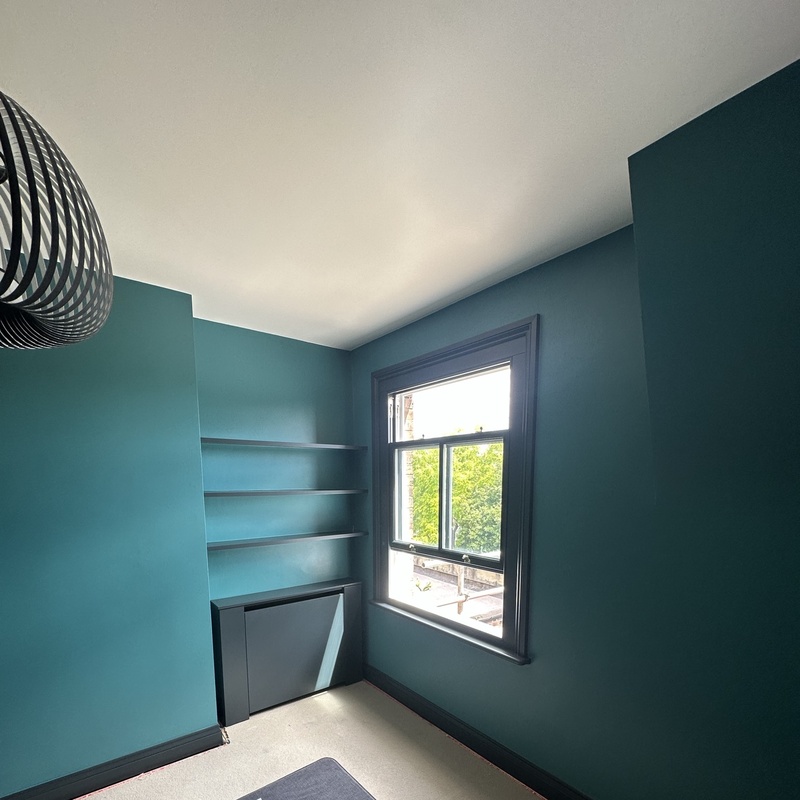 Professional MDF cabinet doors windows frames skirting boards spray painting for bespoke joinery and wardrobes in NW London by Kadeco Interiors.